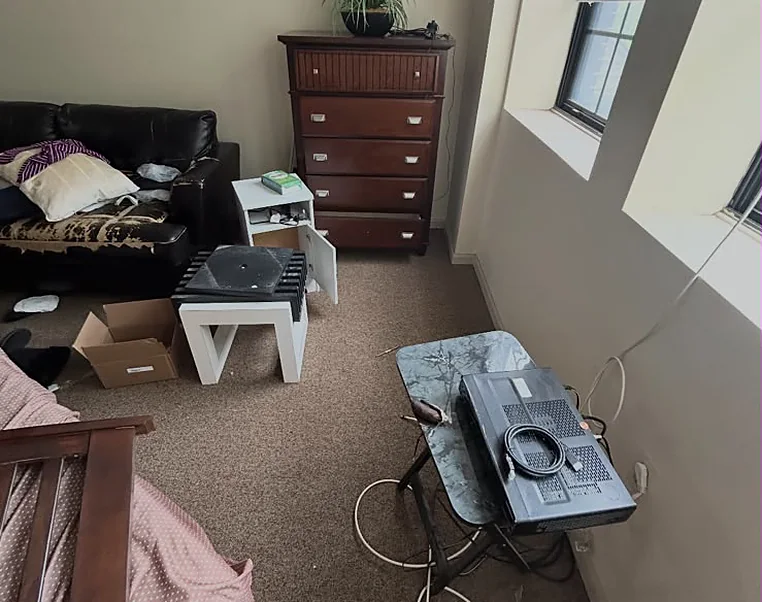 Furniture, boxes and leftover equipment left behind in a rental unit between tenants